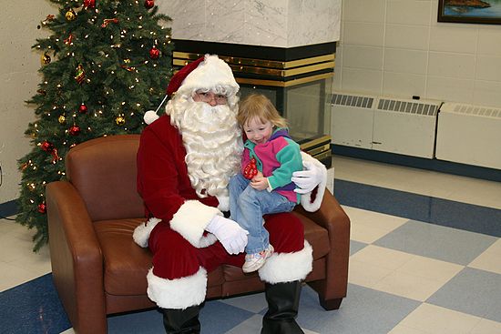 Snuggling with Santa\n(Esso Christmas Party 2006)