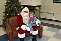 Snuggling with Santa\n(Esso Christmas Party 2006)